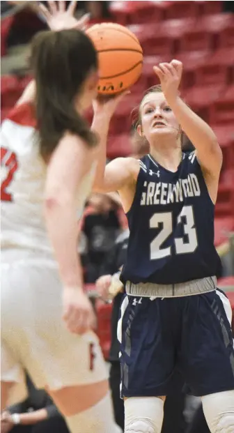  ?? File photo/NWA Democrat-Gazette ?? Greenwood’s Kinley Fisher looks for a shot during the 2019-20 season. The all-state guard and Mercer commit averaged 18.3 points per game and shot 41 percent from 3-point range to help her team earn a 5A state cochampion­ship.