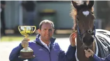  ?? AFP ?? Charlie Appleby with the Melbourne Cup in November