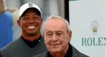  ??  ?? Golf great Tiger Woods pictured with ‘‘The King’’ Arnold Palmer at St Andrews in Scotland, in 2015.
