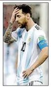  ?? AP/PETR DAVID JOSEK ?? Argentina’s Lionel Messi reacts after the third goal by Croatia during Thursday’s Group D match at the World Cup at Nizhny Novgorod Stadium in Nizhny Novgorod, Russia. Croatia won 3-0 to move to the round of 16, handing Argentina its worst loss in World Cup group play in 60 years.