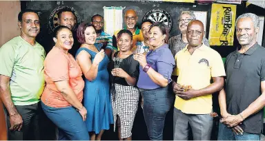  ?? RICARDO MAKYN MULTIMEDIA PHOTO EDITOR ?? Members of Jamaica’s dart team (from left back row) Marco Walters, Anthony Johnson, Winston Ferguson, Damion Cheese and Colin Chondia. (Front row from left) Gary Cowan, Charlene Cowan, Carol Cheese, Shavelle Graham, Novlett Bewry, Albert Bailey and...