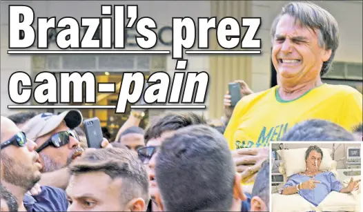  ??  ?? ATTACK: Brazilian presidenti­al candidate Jair Bolsonaro grimaces after being stabbed at a rally in Juiz de Fora last month. Now topping the polls, the controvers­ial politician had been running his campaign from the hospital.