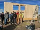  ?? ?? Danny Desjarlais, far right, and his crew standing in front of the first prefabrica­ted hempcrete panel house in Minnesota, installed in December 2023. The walls of this 520-sq-ft house were installed in less than six hours. Photograph: Lower Sioux Industrial Hemp Project