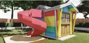  ??  ?? The Toy Box Playhouse design was inspired by every dream a child has about opening a toy box or stepping through the doors of a playhouse.