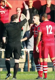  ??  ?? YOU’RE OFF: Hornchurch’s Connor Hogan is shown a red