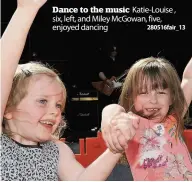  ??  ?? Dance to the music Katie- Louise , six, left, and Miley McGowan, five, enjoyed dancing 280516fair_ 13