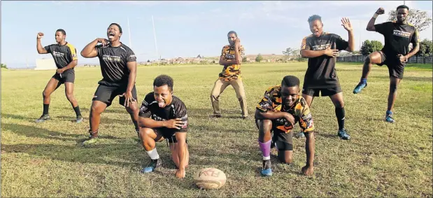  ?? Picture: MICHAEL PINYANA ?? SHOW AND TELL: Winter Rose players and coach perform the haka at NU13 stadium after returning from an exchange programme in New Zealand. The players, from left, are: Akhona Luhabe, Luvo Bazi, Luxolo Jingqi, Songezo Sam (coach), Junior Mlonyeni,...