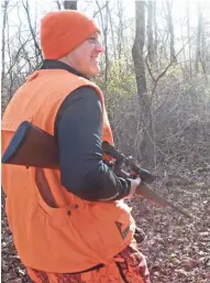  ??  ?? Kent Kramer of Dodgeville walks a path on his property prior to the 2018 Wisconsin gun deer season. The harvest included 104,388 bucks and 107,482 antlerless deer.