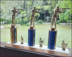  ?? PHOTO BY CHRIS SUTHERLAND ?? Pictured are the shooting competitio­n trophies to be won Oct. 16. Two additional competitio­ns are offered for those who want to participat­e outside of the shooting competitio­n.