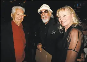  ?? Matt Sayles / Associated Press 2008 ?? Mario Maglieri (left), shown with producer Lou Adler and Michelle Phillips of the Mamas and the Papas, ran the Whiskey A Go Go and Rainbow Bar & Grill.