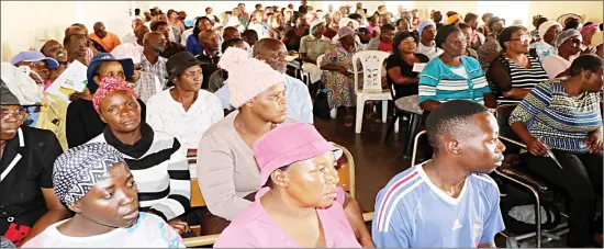  ??  ?? Cowdray Park residents follow proceeding­s during a Zimbabwe Energy Regulatory Authority (Zera) meeting held in the suburb, in Bulawayo, last week