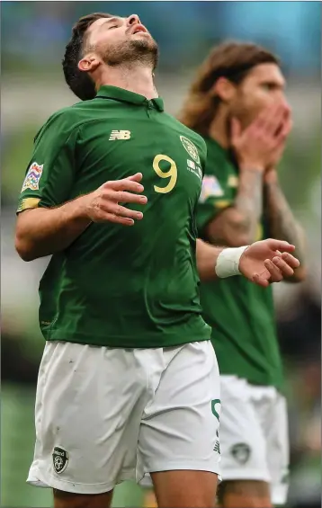  ??  ?? Shane Long of the Republic of Ireland reacts after heading over during the UEFA Nations League B match against Wales in the Aviva Stadium on Sunday.