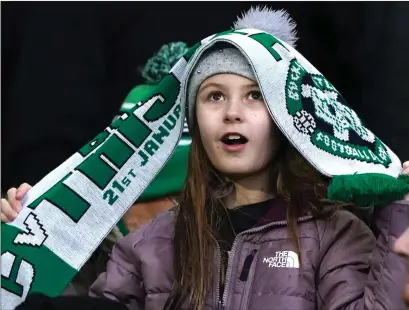  ?? ?? A young Buckie Thistle supporter watches on as her side gave a decent account of themselves in a 5-0 cup defeat to Celtic