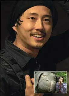  ?? PHOTOS: JAE HYUK LEE/NETFLIX ?? Steven Yeun as K and, inset, An Seo Hyun as Mija in a scene from the movie Okja.