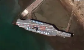  ?? Photograph: Maxar Technologi­es Handout/EPA ?? Satellite image of Iran’s refurbishe­d mockup aircraft carrier in the Strait of Hormuz