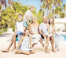  ?? SARAH AND BRYAN BAEUMLER ?? Bryan and Sarah Baeumler with their children at Caerula Mar Club, the resort they renovated for the HGTV series “Renovation Island.”