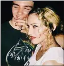  ??  ?? Love tug: Madonna and Rocco