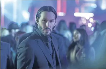  ?? ASSOCIATED PRESS ?? Keanu Reeves reprises his role as John Wick in John Wick: Chapter 2, opening Friday. The movie doesn’t mess with the formula that made the first film a hit.