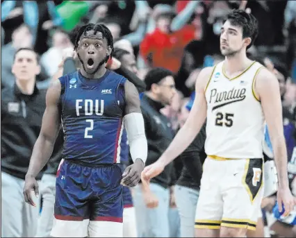  ?? Michael Conroy The Associated Press ?? If Fairleigh Dickinson guard Demetre Roberts was shocked by beating No. 1 Purdue in last season’s NCAA Tournament, imagine how Steve Fezzik felt. He lost $80,000 betting on the Boilermake­rs.
