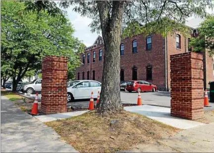  ?? TANIA BARRICKLO — DAILY FREEMAN ?? Brick pillars that are part of the fence project at the Kingston Library are shown on Monday.