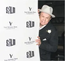  ??  ?? Above: Rapper and screenwrit­er Boots Riley at the SFFilm Awards ceremony, where he was honored for storytelli­ng. Left: Actor John C. Reilly attends the event at the Palace of Fine Arts.