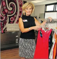  ??  ?? Volunteer Jan Corner at My Best Friend’s Closet, which provides teen girls from low-income homes with new outfits.