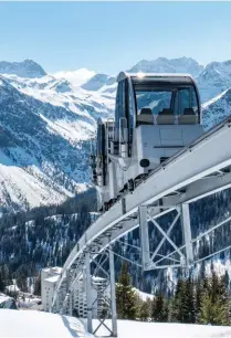  ??  ?? RIGHT: The Tschuggen Grand Hotel’s mountain railway takes skiers to the slopes in less than four minutes
BELOW: The hotel spa