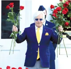  ?? - AFP photo ?? In this file photo taken on September 5, 2020 trainer Bob Baffert celebrates after Authentic won the 146th running of the Kentucky Derby at Churchill Downs in Louisville, Kentucky.