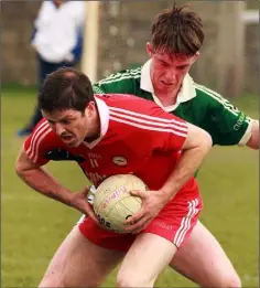  ??  ?? Kilanerin’s Tommy Boland is tackled by Stephen Casserly.