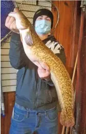  ?? PROVIDED BY PARK BAIT ?? Luc van Brenk with his 9.68-pound Illinois-record burbot, caught Wednesday around Diversey Harbor.