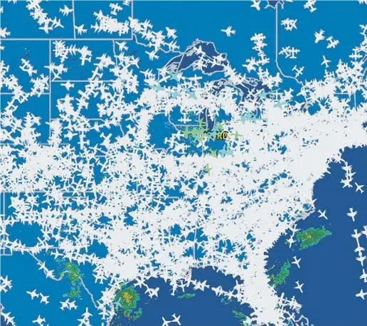 ?? FlightAwa re / The Associat ed Press ?? A screen shot of airline traffic over the United States on Sept. 26, after hundreds of flights were cancelled at Chicago airports, following a fire at a suburban Chicago air traffic control facility.