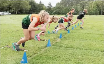  ??  ?? The 100m sprint is always a popular event, as (from left) Hayley Tepper, Darcy Knowles, Emily Rhodes, Tanys Pont and Chloe Marriot begin their race.