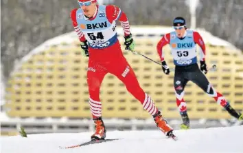  ?? –KEYSTONE ?? Evgeniy Belov, 28 ans, n’est passé en tête que dans les derniers mètres. Suivez sur notre app toute l’actualité et les résultats des différents sports de neige.