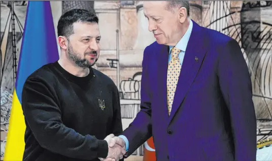  ?? Francisco Seco The Associated Press ?? Turkish President Recep Tayyip Erdogan, right, shakes hands with Ukrainian President Volodymyr Zelenskyy at the end of a joint news conference following their meeting at Dolmabahce palace Friday in Istanbul, Turkey.