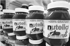  ??  ?? The US$44 billion palm oil industry, under pressure in Europe after authoritie­s listed the edible oil as a cancer risk, has found a vocal ally in the food sector: the maker of Nutella. — Reuters photo