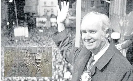  ??  ?? > The bas-relief, inset, of Gwynfor Evans which was based on the picture of the politician waving to the crowds after his 1974 General Election victory