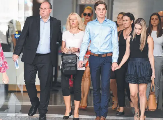  ?? Picture: AAP ?? Anja and Ray Brack (left), parents of Michael Brack, and their supporters leave the Supreme Court in Brisbane yesterday.