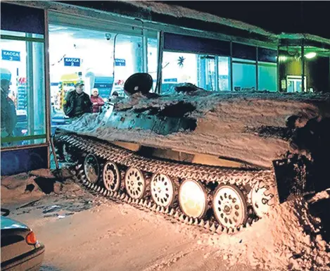  ??  ?? A DRUNK man commandeer­ed an armoured vehicle and crashed it into a shop window in north-western Russia.
The incident happened in the city of Apatity in the Murmansk region on the Arctic Kola Peninsula, according to police.
The man commandeer­ed the