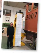  ?? P2SLC ?? 5ft 10in tall Director of Engineerin­g David Elliott is dwarfed by the list of remaining tasks on the project plan to complete the ‘P2’ by the end of 2021.