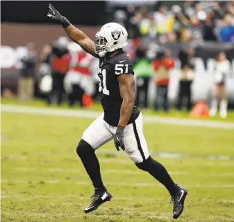  ?? Carlos Avila Gonzalez / The Chronicle 2017 ?? The Raiders’ Bruce Irvin celebrates a sack in a win over Denver at the Coliseum on Nov. 26. After playing mostly at linebacker last season, Irvin will be primarily a defensive end this year.