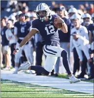  ?? Icon Sportswire / via Getty Images ?? Yale quarterbac­k Nolan Grooms rushes down the field against Columbia in 2019.