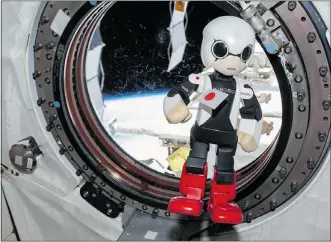  ?? — GETTY IMAGES ?? Japanese humanoid robot Kirobo uttered the first robotic words in space Thursday, showing a combinatio­n of technology and cuteness.