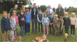  ??  ?? Olympic gold medallist Richard welcomed the children to his shooting school to have a go on the clays