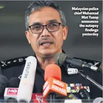  ??  ?? Malaysian police chief Mohamad Mat Yusop announces the autopsy
findings yesterday