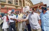  ?? — PTI ?? Congress leader Rahul Gandhi along with other Opposition leaders at a protest march against the curtailmen­t of the Monsoon Session of Parliament in New Delhi on Thursday.