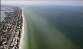  ?? DOUGLAS R. CLIFFORD — TAMPA BAY TIMES VIA AP ?? Red tide is observed near Pinellas County beaches off Redington Beach, Fla., during a flight with SouthWings volunteers on Friday.