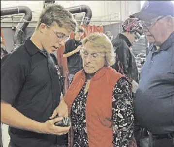  ?? ?? Nate Buell talks to his grandparen­ts, Deb and Ron Schroeder, about the work he’s doing in a welding class. Nate’s ultimate goal is to get into a welding career.