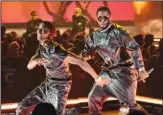  ?? ?? Sean ‘Diddy’ Combs, (right), and Christian Combs perform at BBMA. (AP)