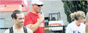  ?? ALLAN BENNER/STANDARD STAFF ?? Brock student and St. Catharines resident Salvatore Fiume, left, was the first to cross the finish line Sunday after finishing all three events at the Naomi Cermak Tri to Inspire triathlon.