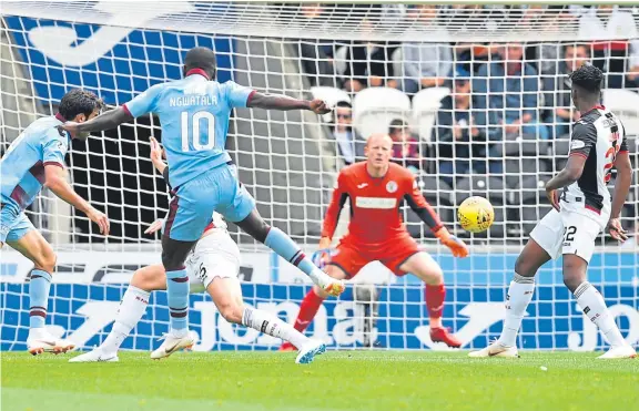  ?? SNS Group. Pictures: ?? Above: Dundee’s Elton Ngwatala scores at Paisley on the opening day of the season as the Dark Blues go down to St Mirren; opposite page: Pavol Safranko has made a real impact at Tannadice this season, much to the delight of Dundee United boss Robbie Neilson; Arbroath manager Dick Campbell has seen his Lichties side extend their lead at the top of League 1 to seven points; St Johnstone players celebrate captain Joe Shaughness­y’s late winner over Hibs at Easter Road.